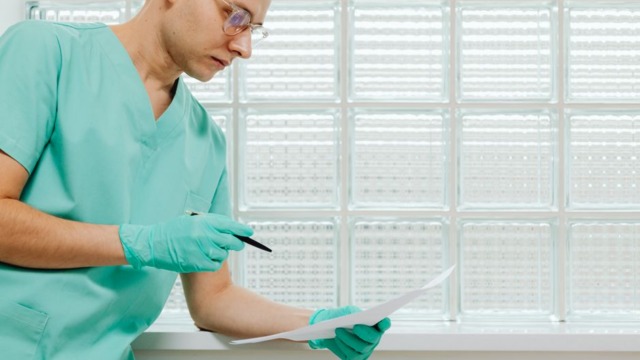 medical technician preparing for life insurance medical exam